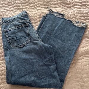 Distressed Blue Denim Jeans